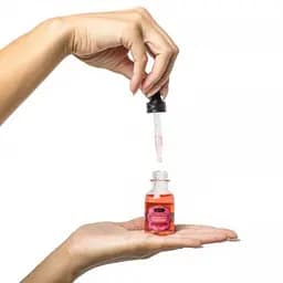 Їстівна олія для поцілунків Kamasutra Oil Of Love Vanilla Creme 22 ml - мініатюра 3